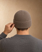 Rook Cashmere Cuffed Beanie, Grey-brown, worn view